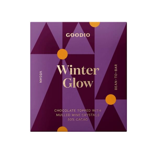 Goodio Winter Glow on joulun kausimaku, jossa 50 % suklaa kohtaa rapeat glögikiteet. Vegaaninen, gluteeniton ja käsintehty Suomessa.